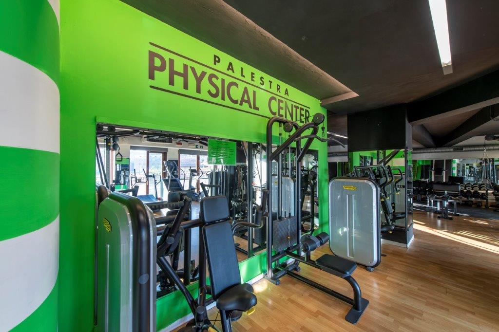 Chest Press, trazione verticale e Leg Press Technogym — sala attrezzi Physical Center, Siena