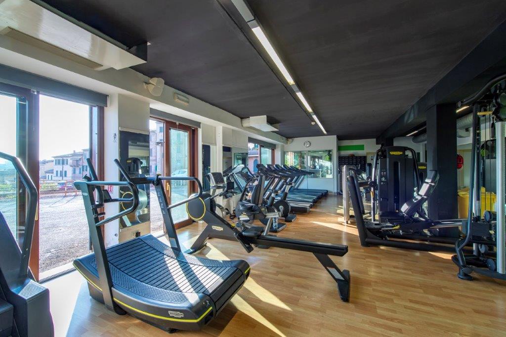 Area cardio con tapis roulant Technogym — Physical Center, Siena